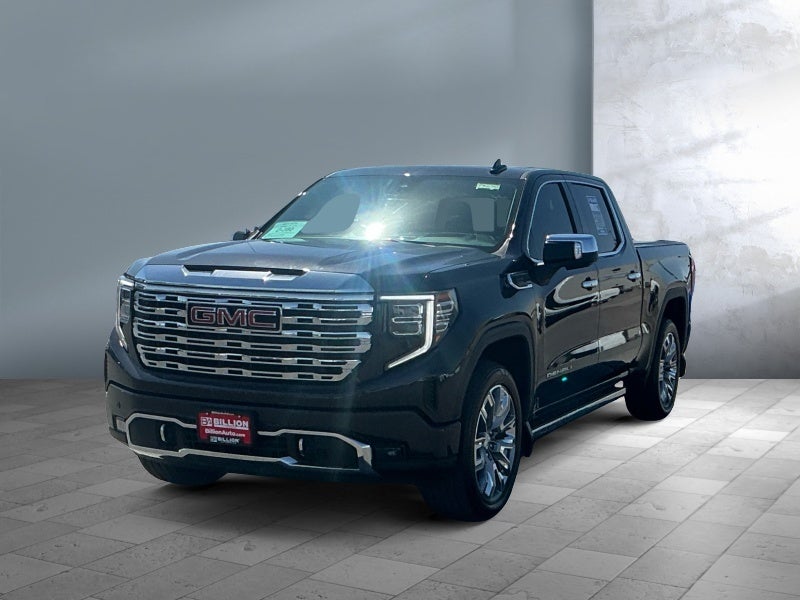 2025 GMC Sierra Denali in Gray — front three-quarter view