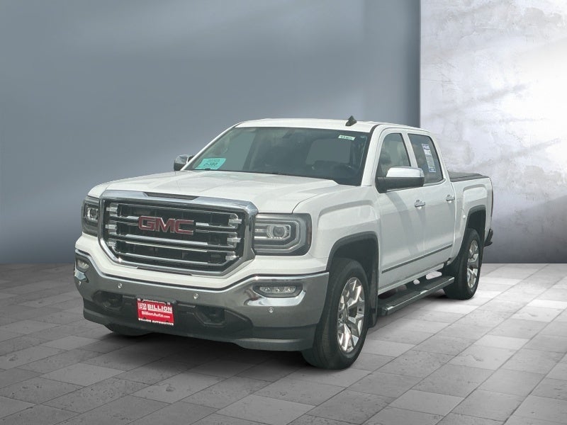 2016 GMC Sierra SLT in White — front three-quarter view