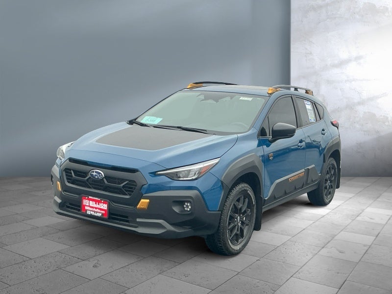 2024 Subaru Crosstrek Wilderness in Blue — front three-quarter view