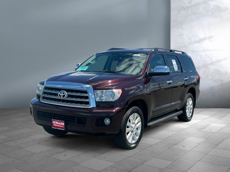 2013 Toyota SEQUOIA Platinum in Sizzling Crimson Mic — front three-quarter view