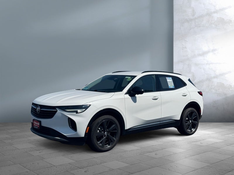 2022 Buick Envision Essence in Summit White — front three-quarter view